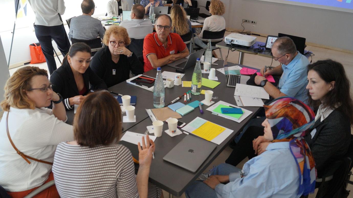 A group of diverse people taking part at the EDEH community workshop in Barcelona