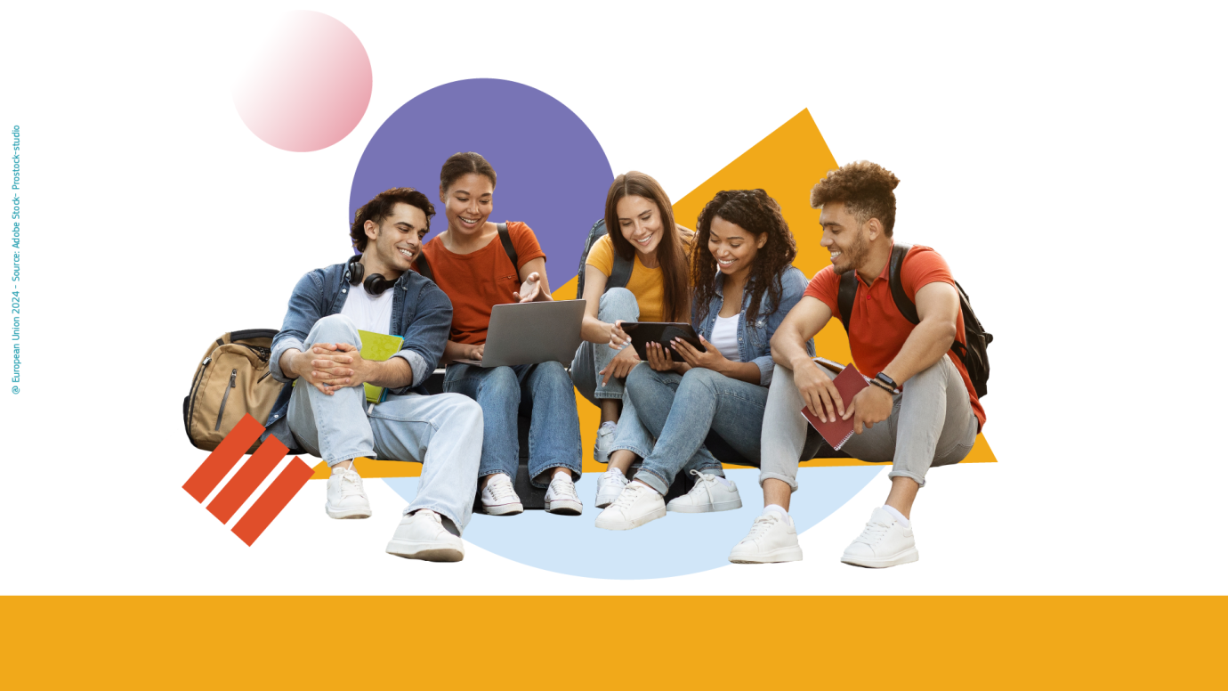 Group of cheerful diverse students working on devices